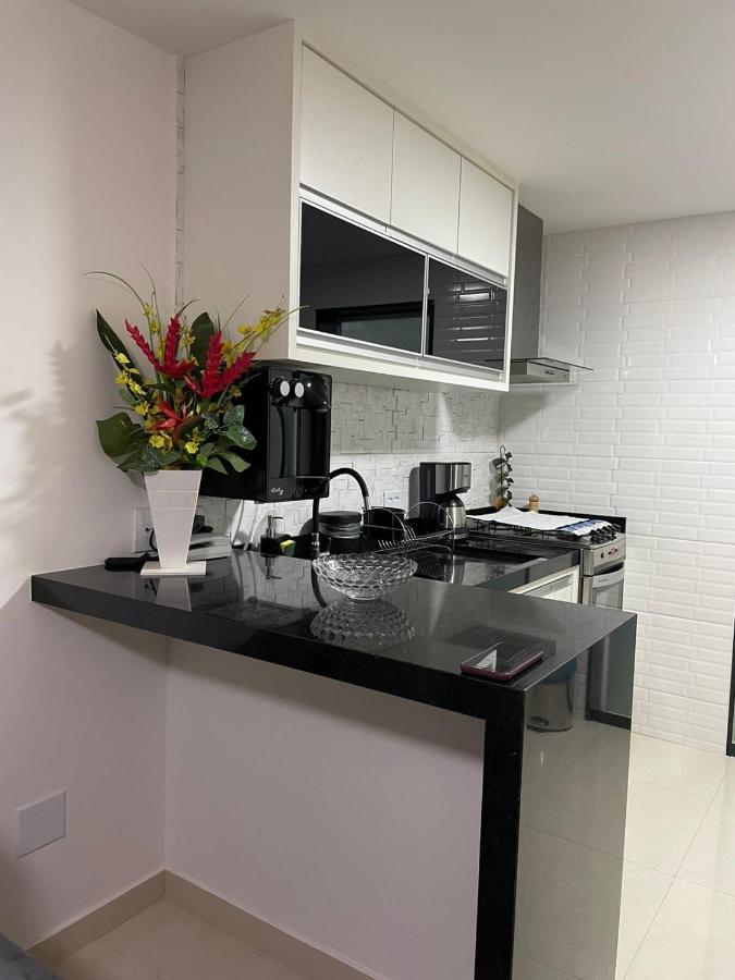 Apartamento moderno e super confortável localizado a alguns passos da Praia Grande Arraial do Cabo Esterno foto