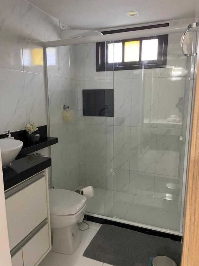 Apartamento moderno e super confortável localizado a alguns passos da Praia Grande Arraial do Cabo Esterno foto