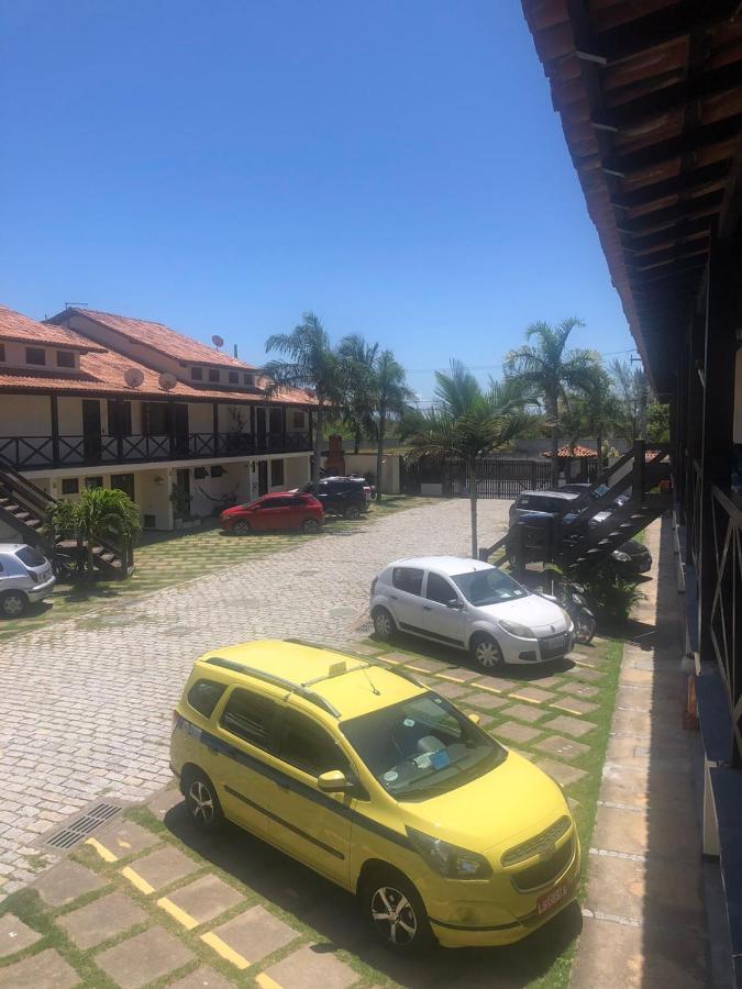 Apartamento moderno e super confortável localizado a alguns passos da Praia Grande Arraial do Cabo Esterno foto