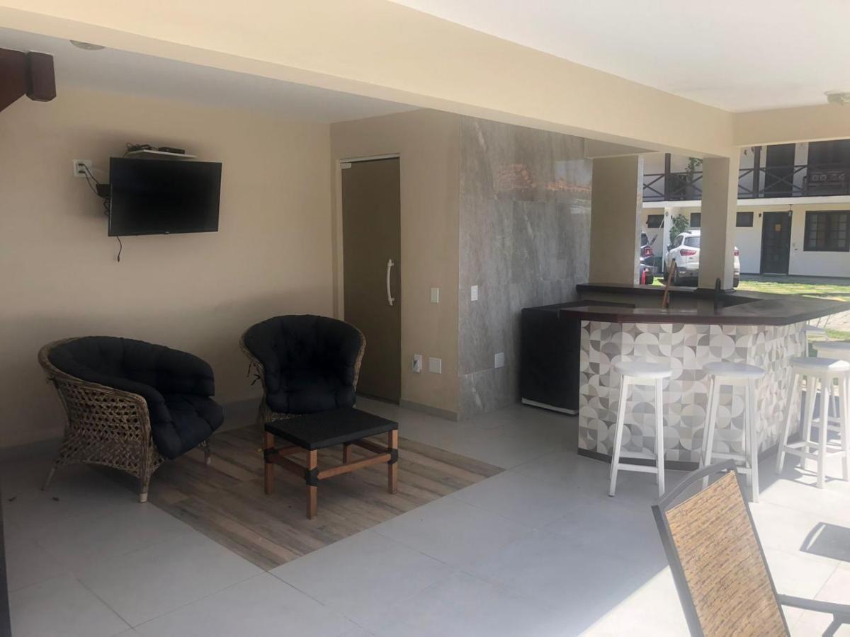 Apartamento moderno e super confortável localizado a alguns passos da Praia Grande Arraial do Cabo Esterno foto