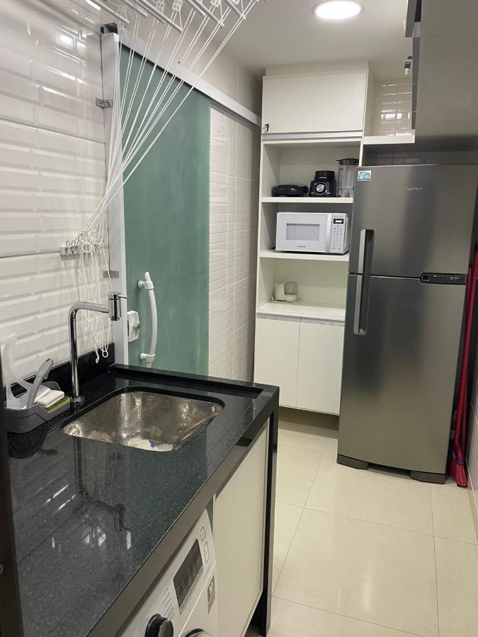 Apartamento moderno e super confortável localizado a alguns passos da Praia Grande Arraial do Cabo Esterno foto